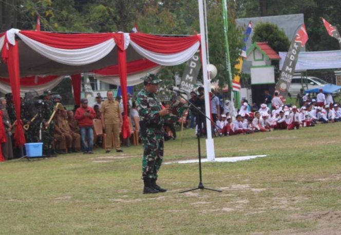 Dandim 0415/Jambi Kolonel Marsal Denny saat membacakan laporan Program TMMD 115 (Foto. Istimewa)