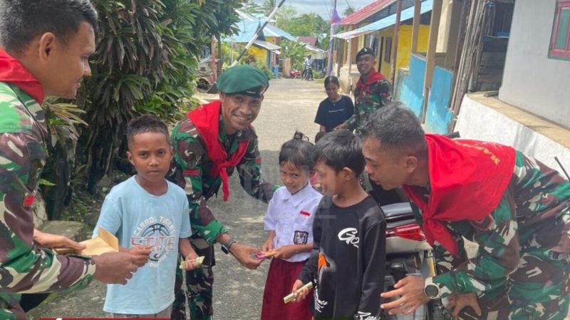Cokelat Kasih Sayang Prajurit Masariku Untuk Siswa SD Tual/ DISPENAD