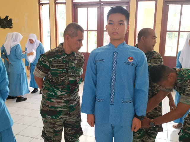 Danramil Pijoan Bersama Tim Ajenrem Sosialisasikan Penerimaan Masuk Akmil Di SMAN Titian Teras Jambi/ FOTO : Dok. siterdim0415jambi