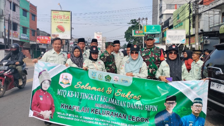 Babinsa Pastikan Pawai Ta'aruf MTQ Ke-6 di Danau Sipin Sukses dan Aman