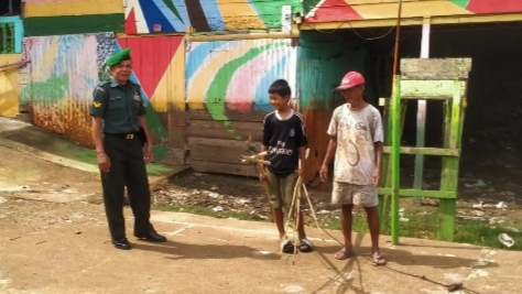 Ciptakan Suasana Harmonis, Babinsa Pasar Sambangi Kampung Pancasila/Ist